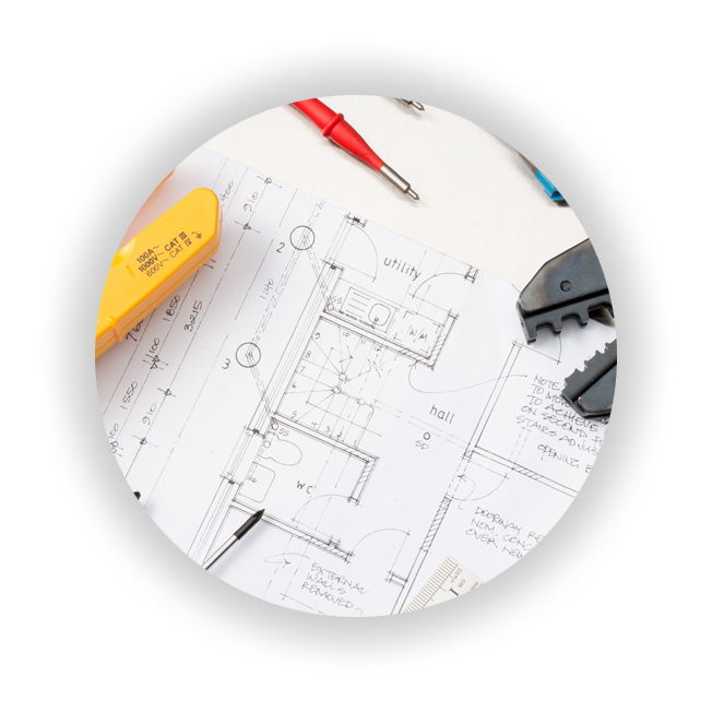 Electrical tools and components on top of Electrician's Blueprints